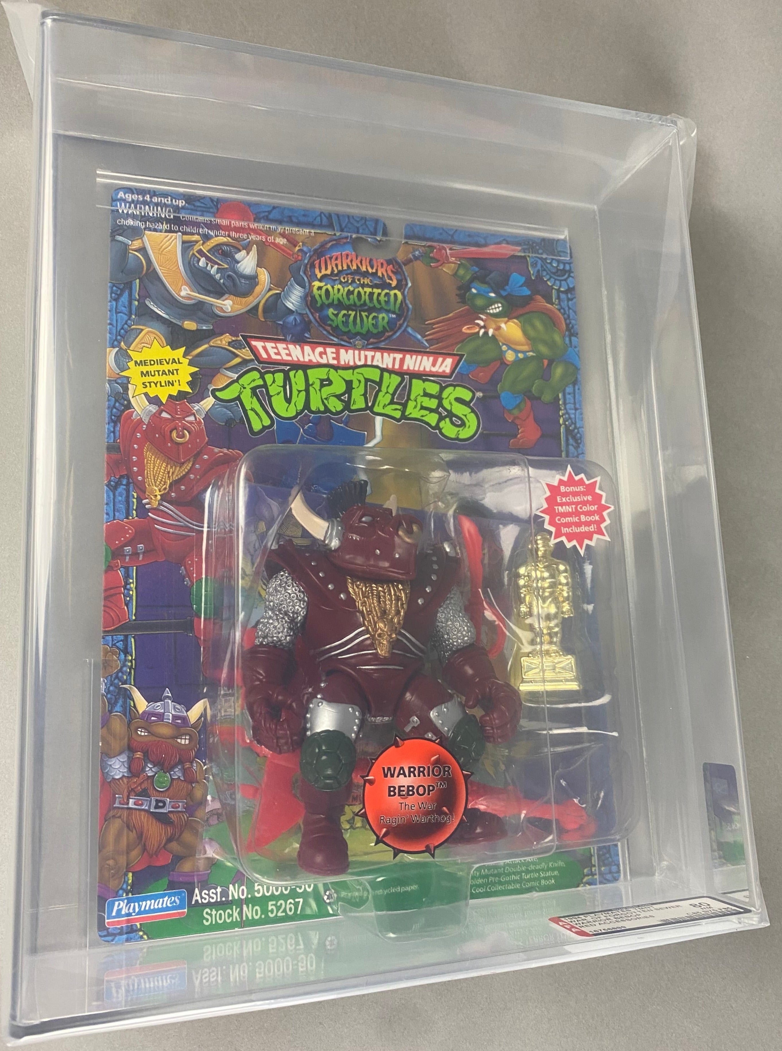 Teenage Mutant Ninja Turtles Warrior Bebop boxed figure AFA graded 80. Front photo.